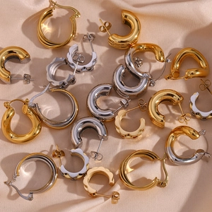 Double-layered C-shaped stainless steel hoop earrings in gold and silver finishes