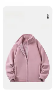 Close-up of pink polar fleece jacket texture with zipper and hidden side pockets