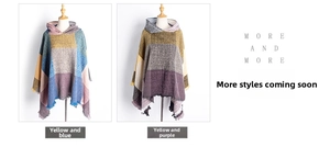Detail of plaid hooded poncho with colorful geometric patterns and fringe trim