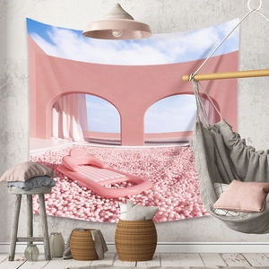 Detail of bohemian tapestry featuring surreal pink arches and pool over a white wall