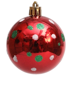 Close-up of red Christmas ball with green and white glitter dots and gold cap