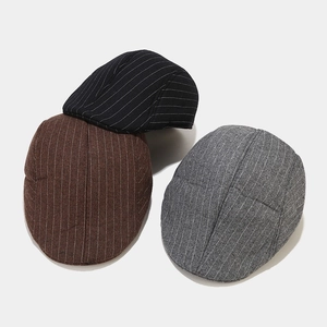 British style newsboy caps in brown black and grey with fine white vertical stripes