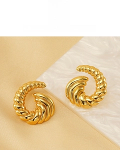 Detailed view of 18K gold plated spiral stud earrings with elegant croissant texture