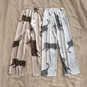Women's ice silk wide-leg lounge pants with leopard print in gold and pearl white colors