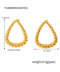 Detail showing dimensions of gold twisted teardrop earrings made of titanium steel