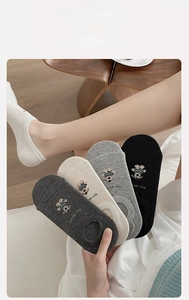 Close-up of low cut cotton socks with cute bear embroidery and multi-color options