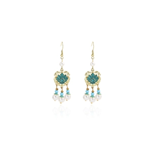 Detail of Chinese style lotus earrings with pearls and sky blue beads tassels