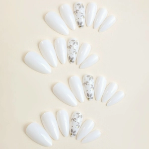 Almond shaped white press-on nails set with elegant silver flower patterns and 24 pieces