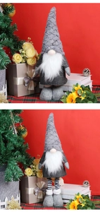 Close-up of Nordic Christmas gnome plush with striped telescopic legs and white beard