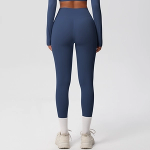 Rear view of dark blue high-waisted yoga leggings with seamless moisture-wicking fabric