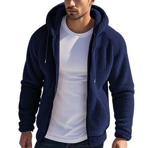 Detail of soft dark blue double-sided fleece texture on hooded zip jacket for men