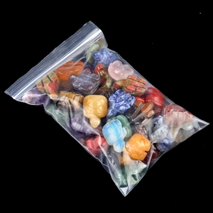 Bulk assortment of hand-carved gemstone turtle figurines in various colorful natural stones