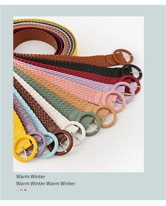Selection of colorful woven PU leather belts with round buckles shown in a fan layout