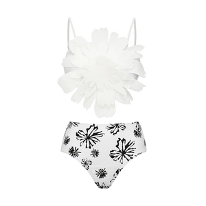 Detail of 3D floral decoration on white bikini top with high-waisted floral print bottom