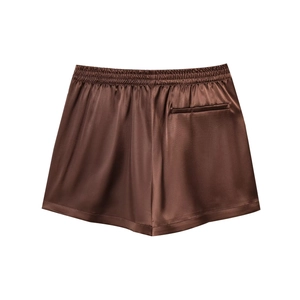 Deep brown satin shorts with elastic waistband and smooth silk-like texture for casual wear