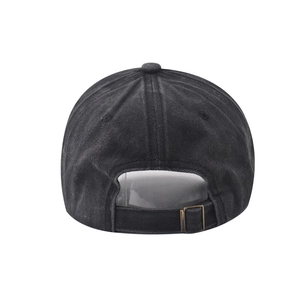 Detail view of washed cotton baseball cap with vintage metal buckle and adjustable strap