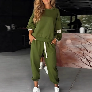 Olive green knitted two-piece set featuring long sleeve sweatshirt and wide leg pants