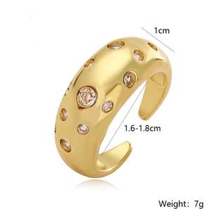Polished gold plated open ring with cubic zirconia inlay and 1cm wide band surface
