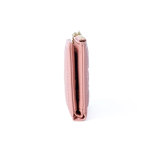 Close-up of pink faux leather wallet with lychee grain texture and gold zipper detail