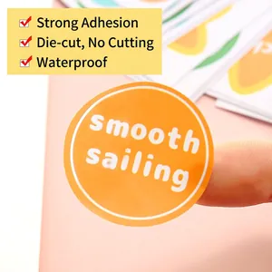 Waterproof orange round sticker with white smooth sailing text for creative packaging