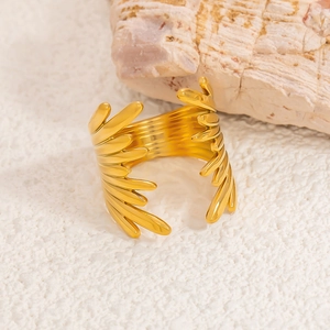 Exaggerated 18k gold plated stainless steel open ring with a detailed feather wing design