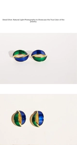 Detail shot of blue and green enamel wavy geometric earrings with gold finish
