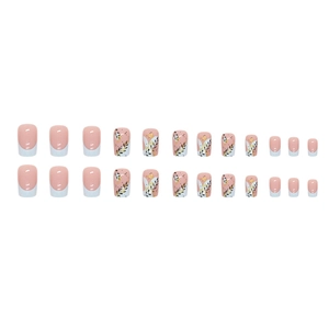 Unghie finte french rosa con motivi di foglie nere e dettagli glitterati dorati