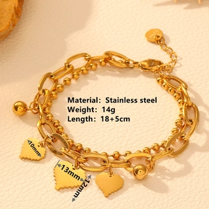Golden stainless steel double-layered bracelet with three heart charms and metal beads