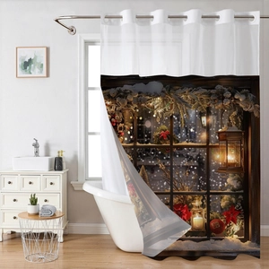 Detail of Christmas shower curtain with hanging rings and festive snowy window scenery