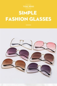 Flat lay of rimless sunglasses in multiple gradient tints with elegant gold metal temples