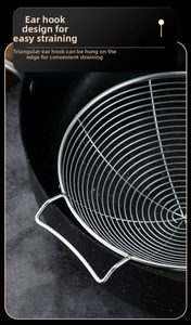 Close-up of a 304 stainless steel strainer with triangular hooks resting on a black pot