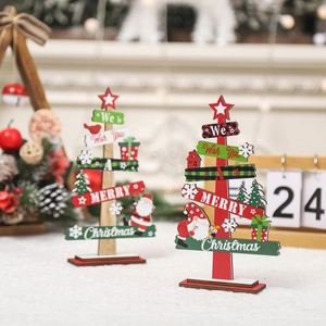 Set of two decorative wooden Christmas trees for tabletop display with festive ornaments