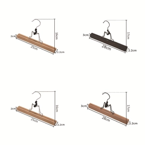 Detailed view of wood and metal skirt hangers in various sizes and natural finishes