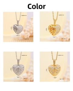 Detail view of heart wing pendants in gold and silver with dimensions and weight specs