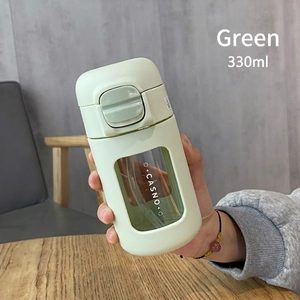 Close-up of 330ml mint green portable water bottle with CASNO logo and matte finish