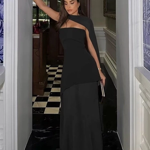 Elegant black one-shoulder maxi dress with cutout detail and high slit for evening wear