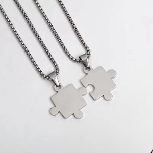 Customizable puzzle piece necklaces for couples in polished silver titanium steel