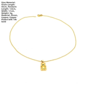 Detailed view of 18K gold plated bear pendant with dimensions 1.8x1.1cm and 45cm chain
