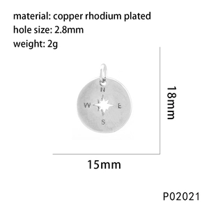 Macro view of 15x18mm rhodium plated brass compass charm with N/S/E/W markings