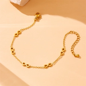 Elegant gold-plated stainless steel chain bracelet with infinity charms and lobster clasp