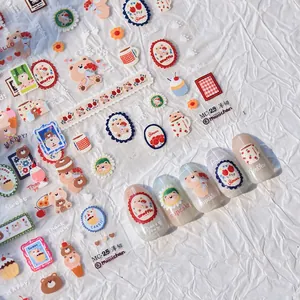 Close-up of Japanese cute bear and coffee break nail art stickers for manicure