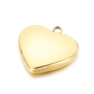 Close-up of a polished gold heart-shaped stainless steel pendant with a shiny metallic finish