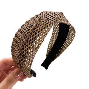 Brown hand-woven wide headband with breathable straw texture for summer hair styling
