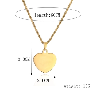 Detail showing dimensions of the gold heart pendant necklace with chain length specifications