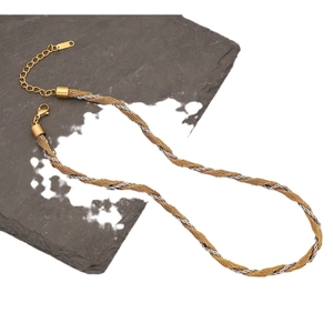 Two-tone mixed metal Cuban link necklace with gold and silver geometric design