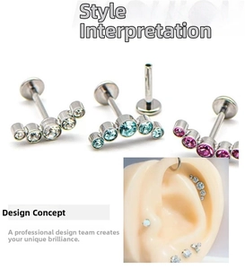 Macro detail of internally threaded stainless steel labret studs with five crystal gems
