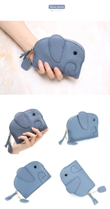Detail of blue elephant coin purse featuring lychee grain leather and tassel zipper