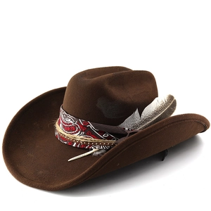 Detail of vintage wool cowboy hat with bohemian print band, hemp rope, and a real feather