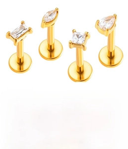 Detail of 4-piece gold stainless steel flat back studs with zircon geometric shapes