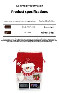 Detail view of 17x22cm Christmas gift bag with knitted snowman pattern and snowflake motif